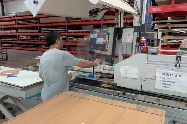 Panel being machined on the cutting line