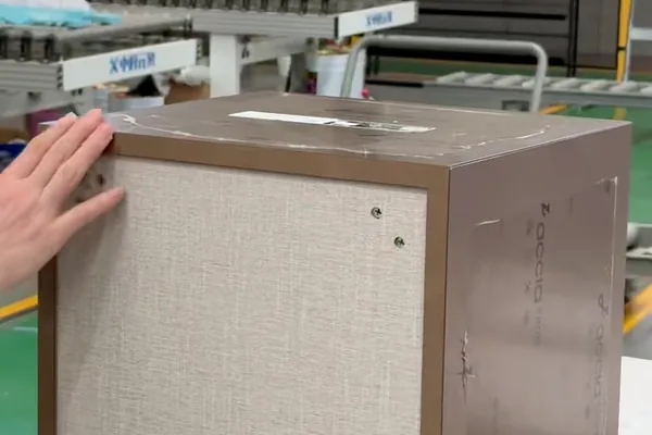 An assembled cabinet unit checked on the bench